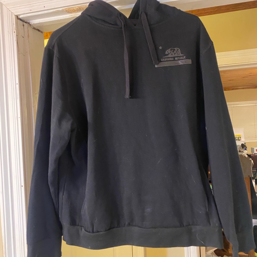 Rings of Fire sweatshirt hoodie california in left shoulder front. Tone on tone